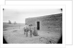 Women and Child Outside Ranch House by Anonymous