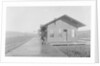 Man Waiting at Railroad Station by Anonymous
