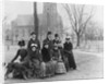 People Sitting Near a Church in Winter by Anonymous