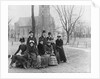People Sitting Near a Church in Winter by Anonymous