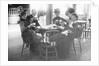 People Sitting with Drinks by Anonymous