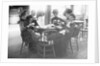 People Sitting with Drinks by Anonymous