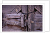 Chains and Lock on Weathered Barn Door by Anonymous