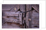Chains and Lock on Weathered Barn Door by Anonymous