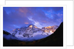 Sunrise on Snow-Covered Mountains by Anonymous