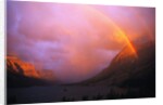 Rainbow and Clouds over a Valley by Anonymous