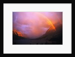 Rainbow and Clouds over a Valley by Anonymous