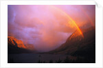 Rainbow and Clouds over a Valley by Anonymous