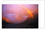 Rainbow and Clouds over a Valley by Anonymous
