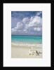 Lone Lounge Chair on Sandy Beach by Anonymous