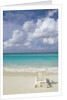 Lone Lounge Chair on Sandy Beach by Anonymous