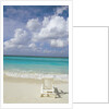 Lone Lounge Chair on Sandy Beach by Anonymous
