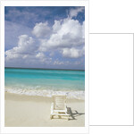 Lone Lounge Chair on Sandy Beach by Anonymous