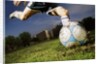Soccer Player Kicking Ball by Anonymous