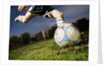 Soccer Player Kicking Ball by Anonymous