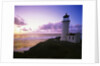 Lighthouse by Beach at Sunset by Anonymous