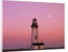 Lighthouse by Beach at Dusk by Anonymous