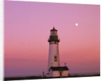 Lighthouse by Beach at Dusk by Anonymous