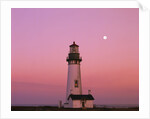 Lighthouse by Beach at Dusk by Anonymous