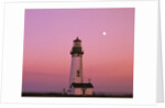 Lighthouse by Beach at Dusk by Anonymous