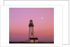 Lighthouse by Beach at Dusk by Anonymous