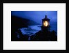 Lighthouse Protecting Misty Coastline by Anonymous