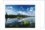 Clouds in Sky Reflected by Mountain Lake by Anonymous