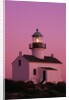 Lighthouse Against a Pink Sky at Twilight by Anonymous