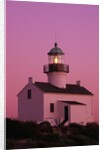 Lighthouse Against a Pink Sky at Twilight by Anonymous
