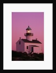 Lighthouse Against a Pink Sky at Twilight by Anonymous