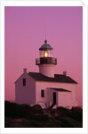 Lighthouse Against a Pink Sky at Twilight by Anonymous