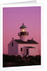 Lighthouse Against a Pink Sky at Twilight by Anonymous