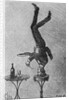 Man Standing on his Head Eating by Anonymous