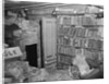 Interior View of a Room Full of Books and Cartons by Corbis