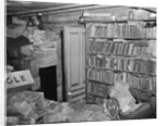 Interior View of a Room Full of Books and Cartons by Corbis