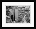 Interior View of a Room Full of Books and Cartons by Corbis