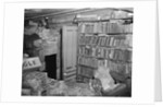 Interior View of a Room Full of Books and Cartons by Anonymous