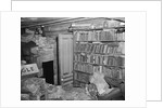 Interior View of a Room Full of Books and Cartons by Corbis