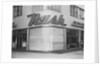 Nash Auto Dealership with Boarded-up Window by Anonymous