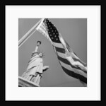 View of Statue of Liberty and American Flag by Anonymous
