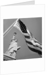 View of Statue of Liberty and American Flag by Anonymous