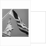 View of Statue of Liberty and American Flag by Anonymous