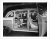 Interior View of Passengers Inside a New York City Checker Cab by Anonymous