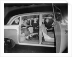 Interior View of Passengers Inside a New York City Checker Cab by Anonymous
