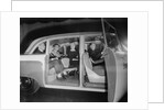 Interior View of Passengers Inside a New York City Checker Cab by Anonymous