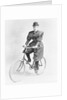 Suffragette Dressed in Man's Hat on Bicycle by Anonymous