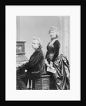Evard Grieg Playing Piano with Wife Looking On by Anonymous