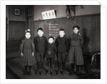 Children Posing in Classroom by Anonymous