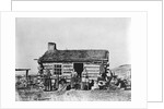 Mormon Family Outside Log Cabin by Anonymous