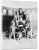 Animal Trainer Posing with Lions by Anonymous